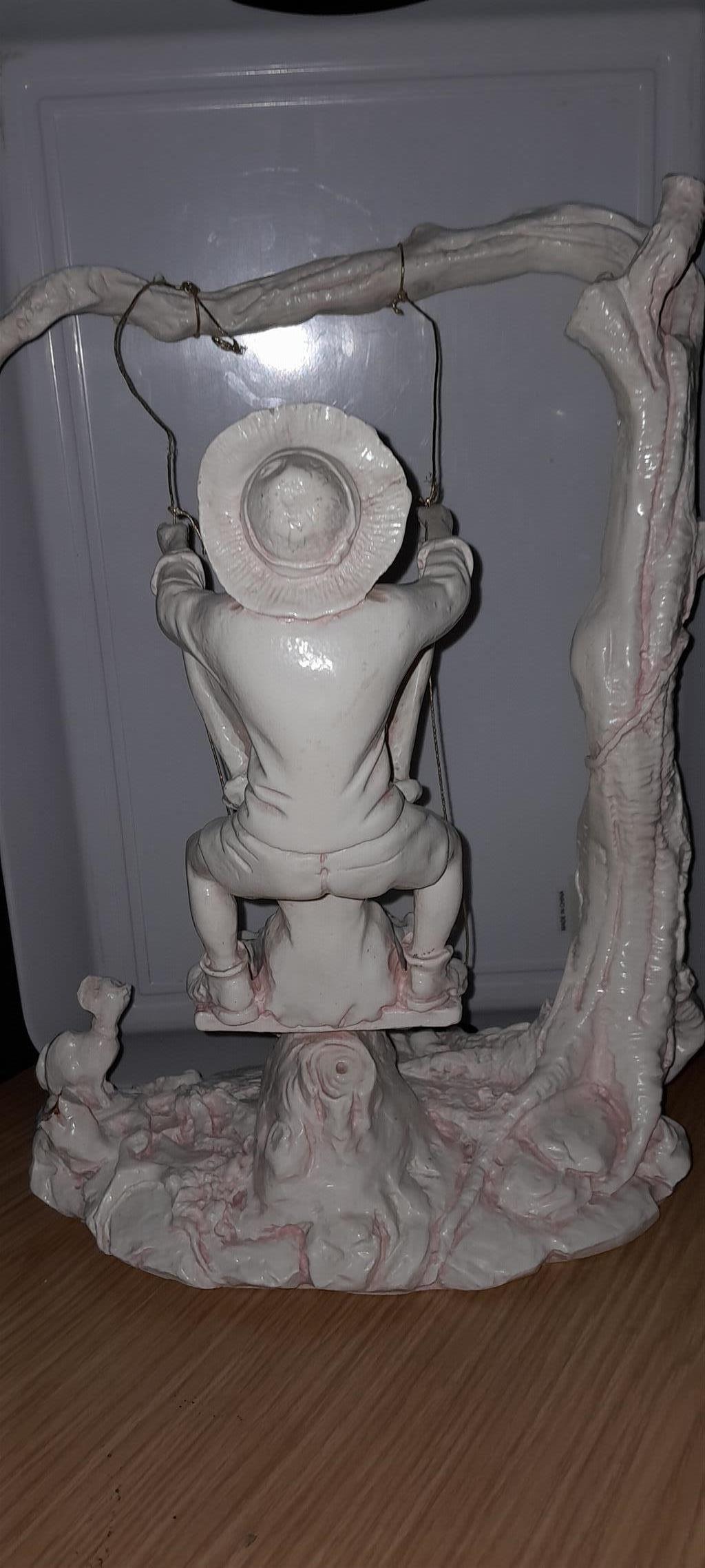 Giuseppe Armani The swing statue