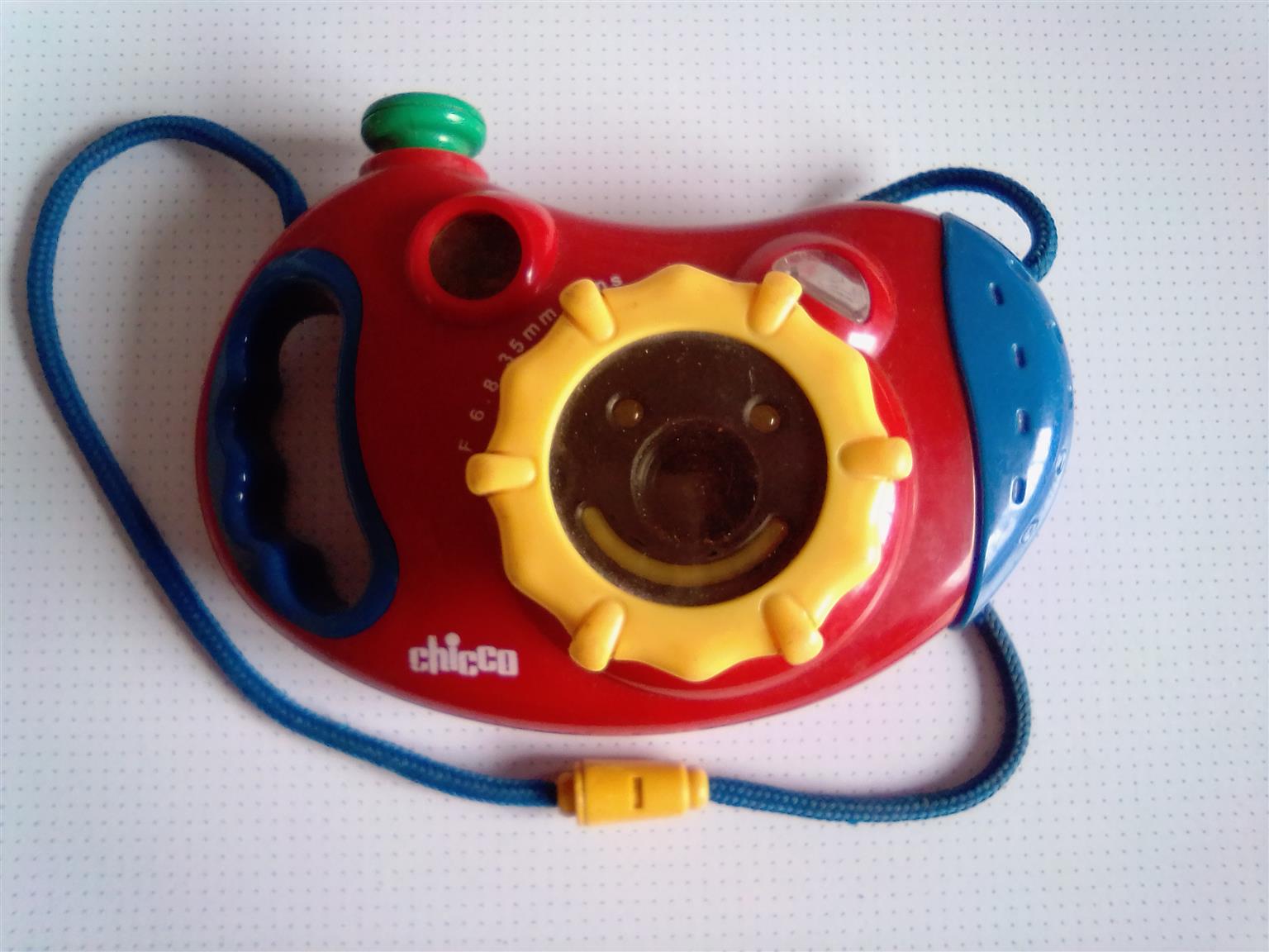 Chicco Film Camera. In smiley face shape. Chicco Film Camera. In smiley face shape.