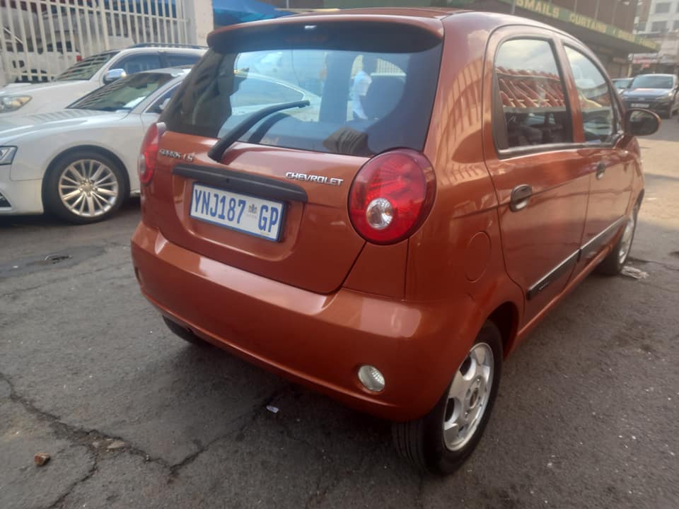 2009 CHEVROLET SPARK 1.1 PETROL, MANUAL TRANSMISSION, ORANGE COLOUR, MILEAGE