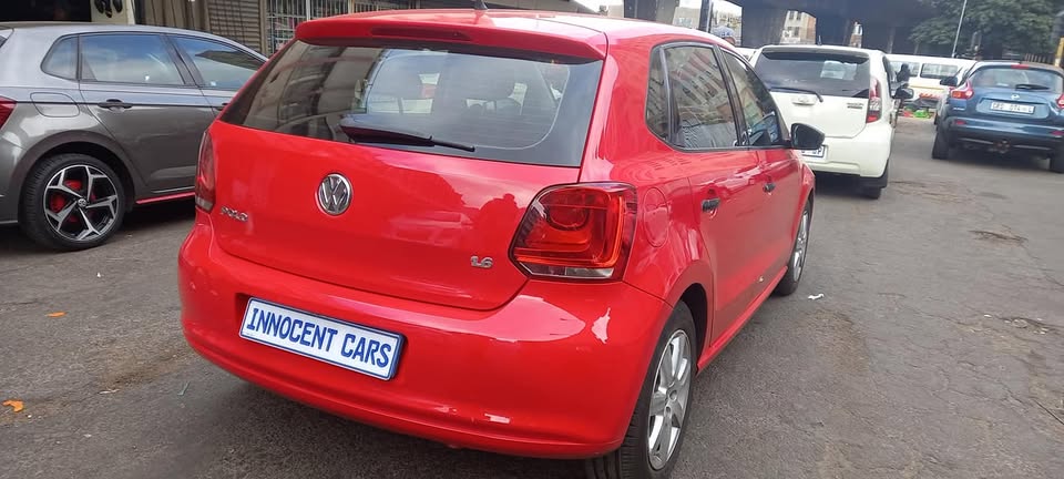 2012 VW POLO 6 1.4 TRENDLINE MANUAL TRANSMISSION.. RED COLOUR.. .. USED..