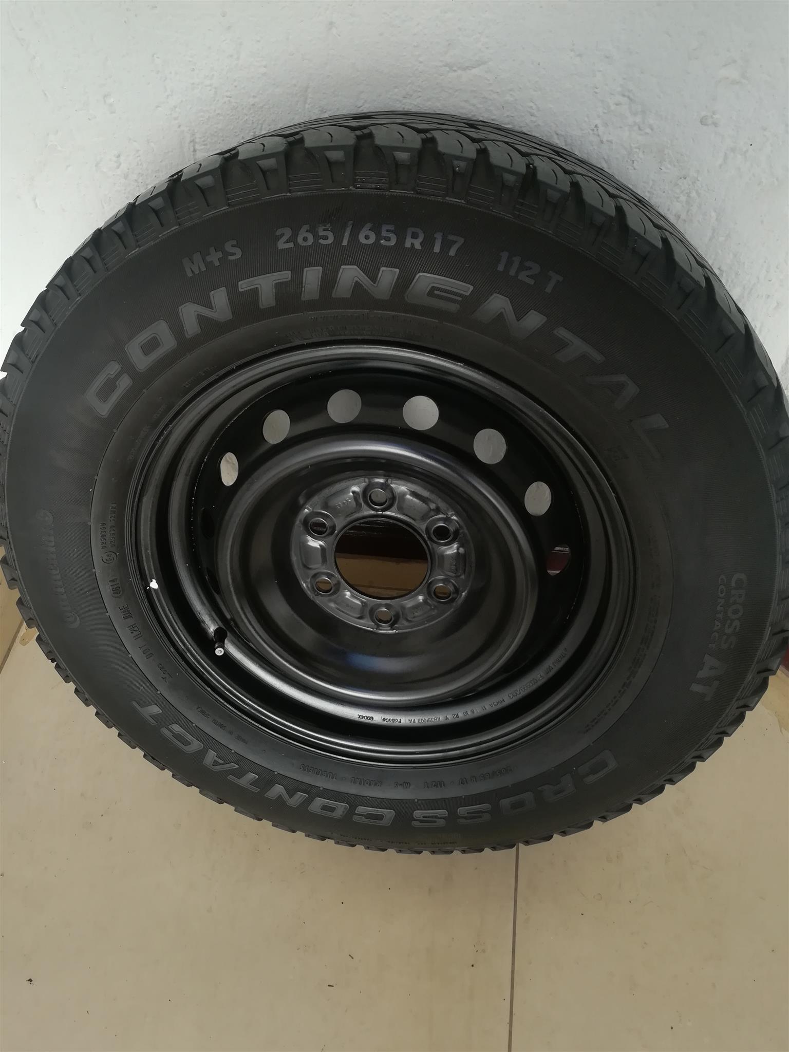 One Good Used Original 17 inch Ford Ranger Spare Wheel with Continental