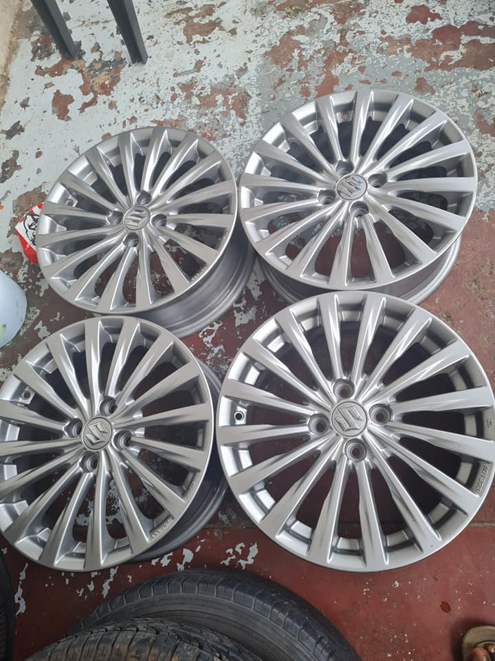 Suzuki swift original alloy mags size 16 - Private Seller