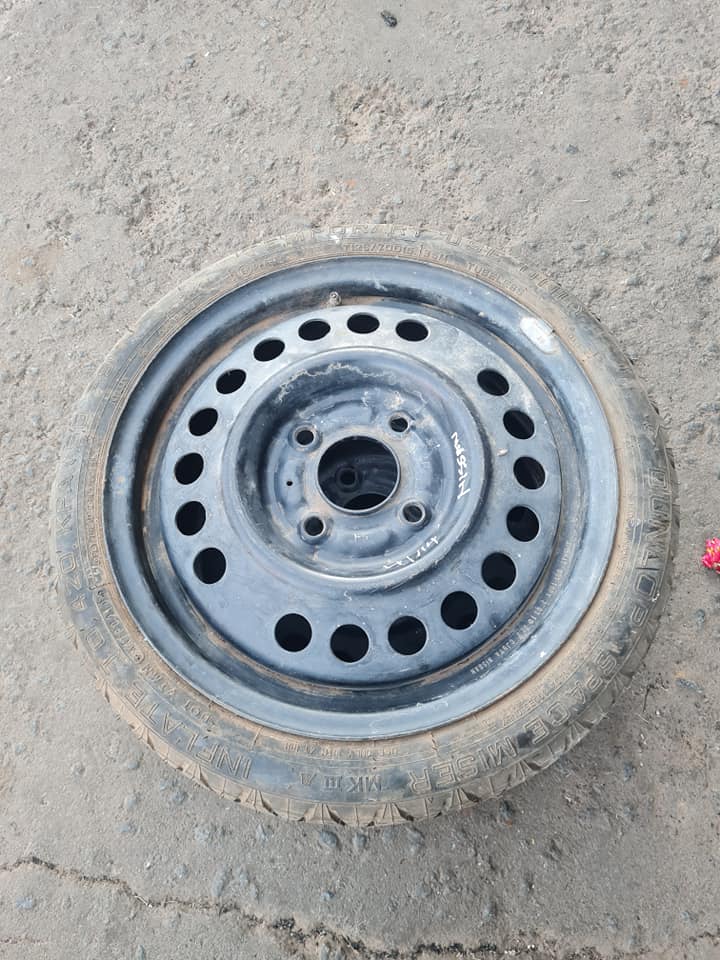 Nissan marrie biscuit tyre size 15