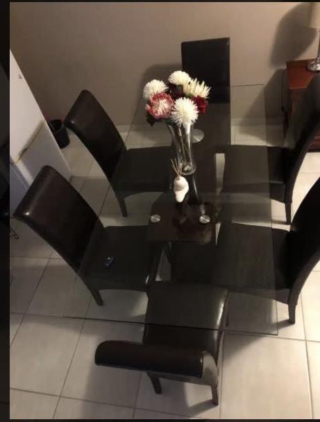 glass dining table and 6 chairs