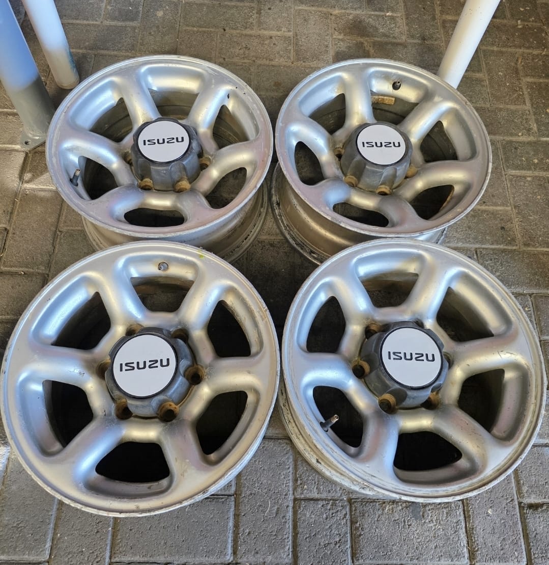 Isuzu centre caps - FOR MAGS AND RIMS. - Private Seller Isuzu centre caps - FOR MAGS AND RIMS. - Private Seller