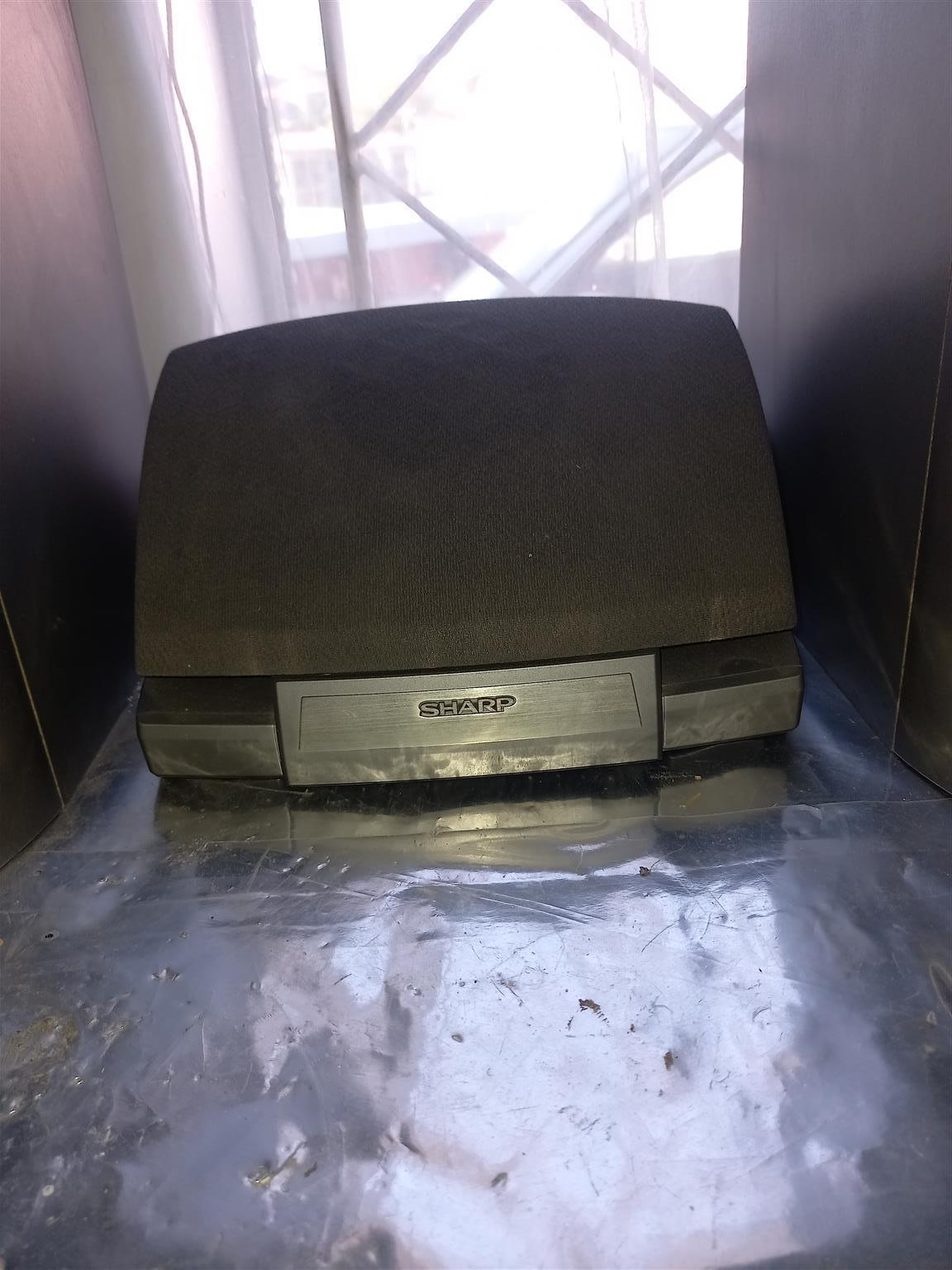 2 "Sharp" Hi Fi speakers including 2 surround & 1 centre speaker.