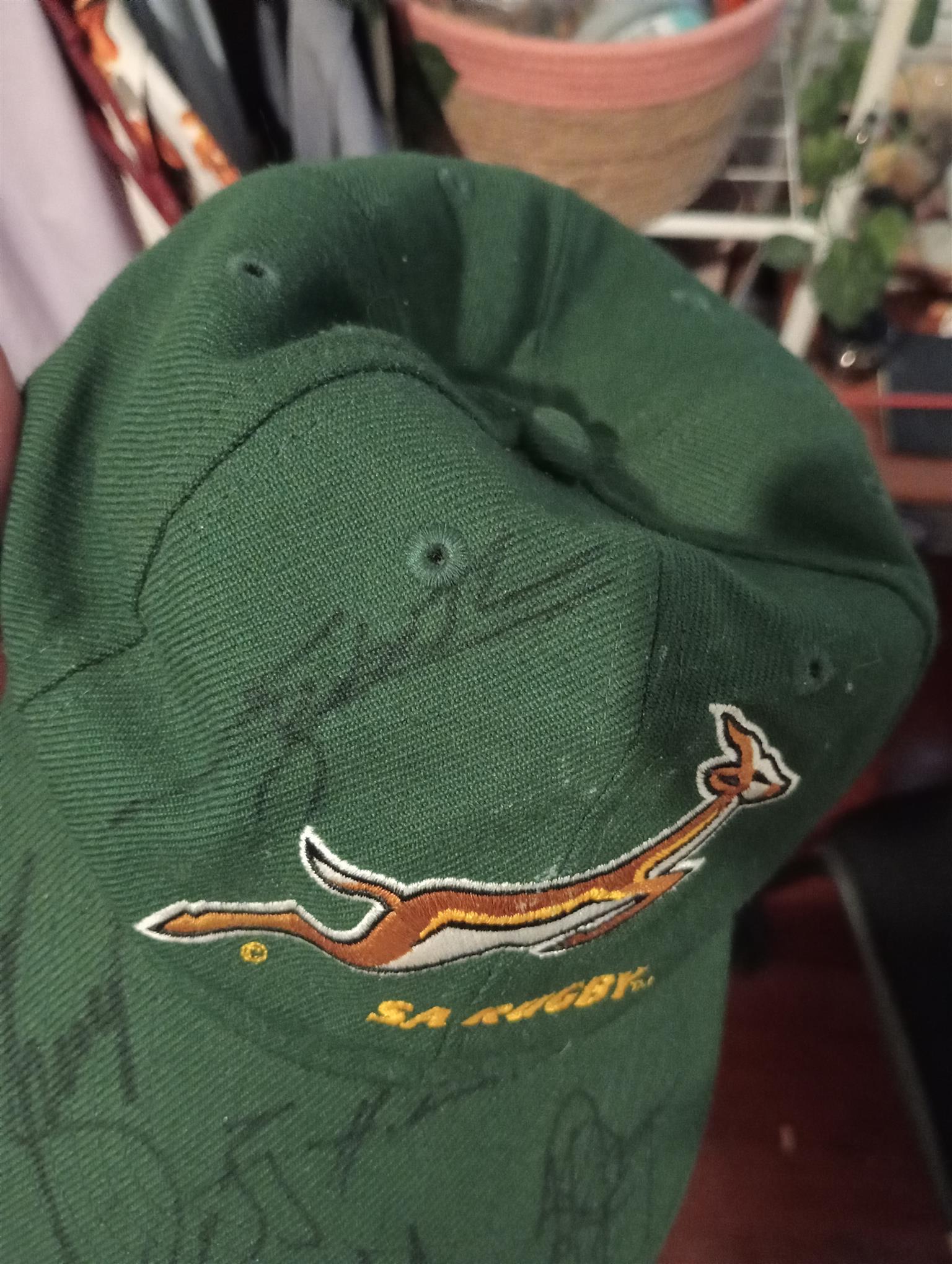 A cap signed by the springbok rugby team.