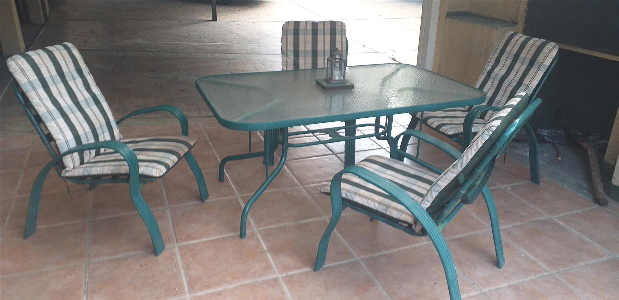 glass patio table with chairs