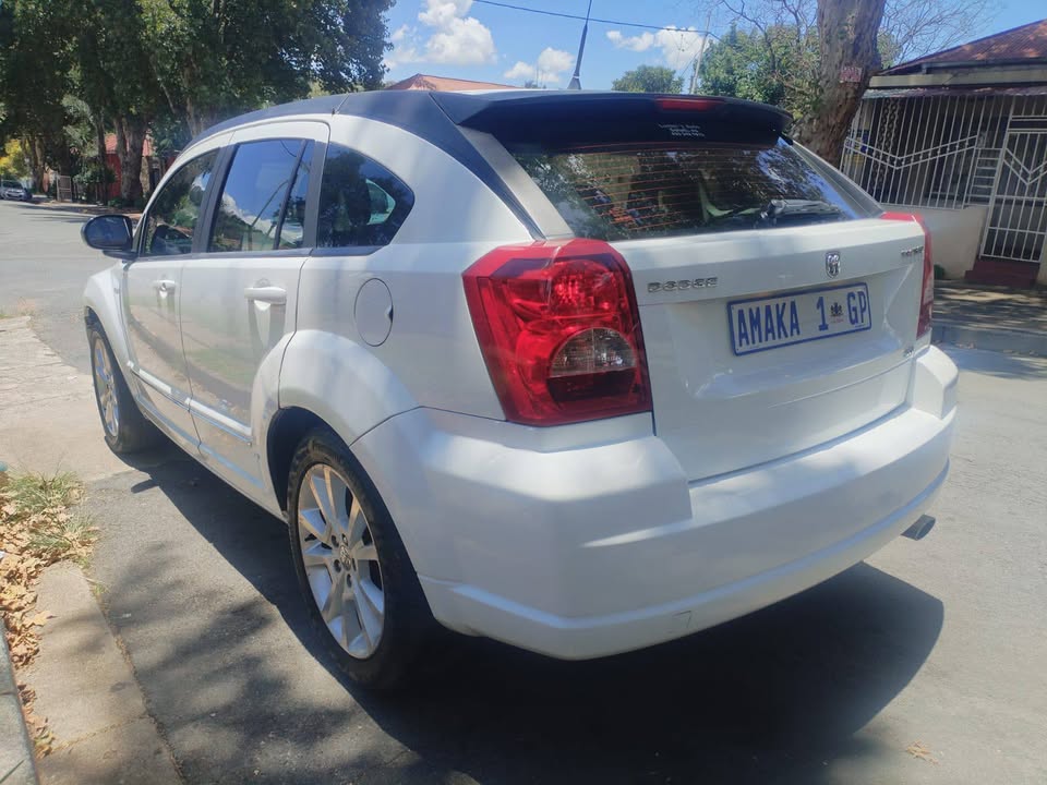 2012 DODGE CALIBER SXT 2.0 Petrol, Manual, White Color, Mileage 102000kms