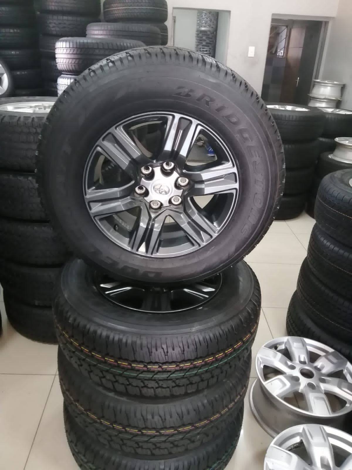 17" Toyota Hilux/Fortuner OEM mags wit brand new 265/65/17 Bridgestone Dueller A - Private Seller 17" Toyota Hilux/Fortuner OEM mags wit brand new 265/65/17 Bridgestone Dueller A - Private Seller