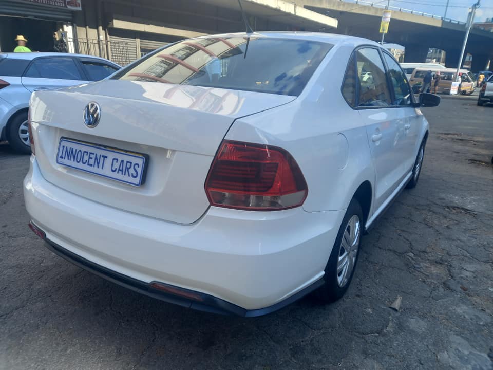 2021 VW POLO 6 SEDAN 1.4 PETROL, MANUAL TRANSMISSION, WHITE COLOUR, MILEAGE 29000KM