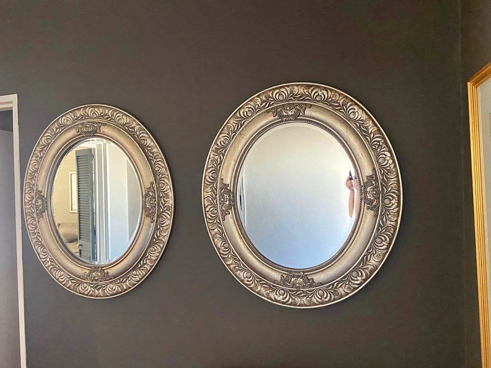 2 x Silver Oval carved Mirrors. Size 90x 80. Collect in Seapoint