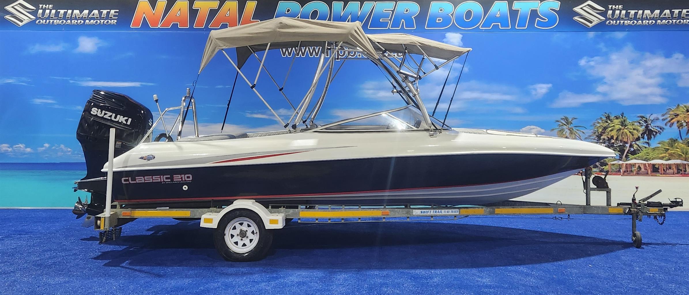 CLASSIC 210 ON TRAILER 300 HP SUZUKI 4 STROKE 2017 MODEL MOTOR 128 HOUR CLASSIC 210 ON TRAILER 300 HP SUZUKI 4 STROKE 2017 MODEL MOTOR 128 HOUR