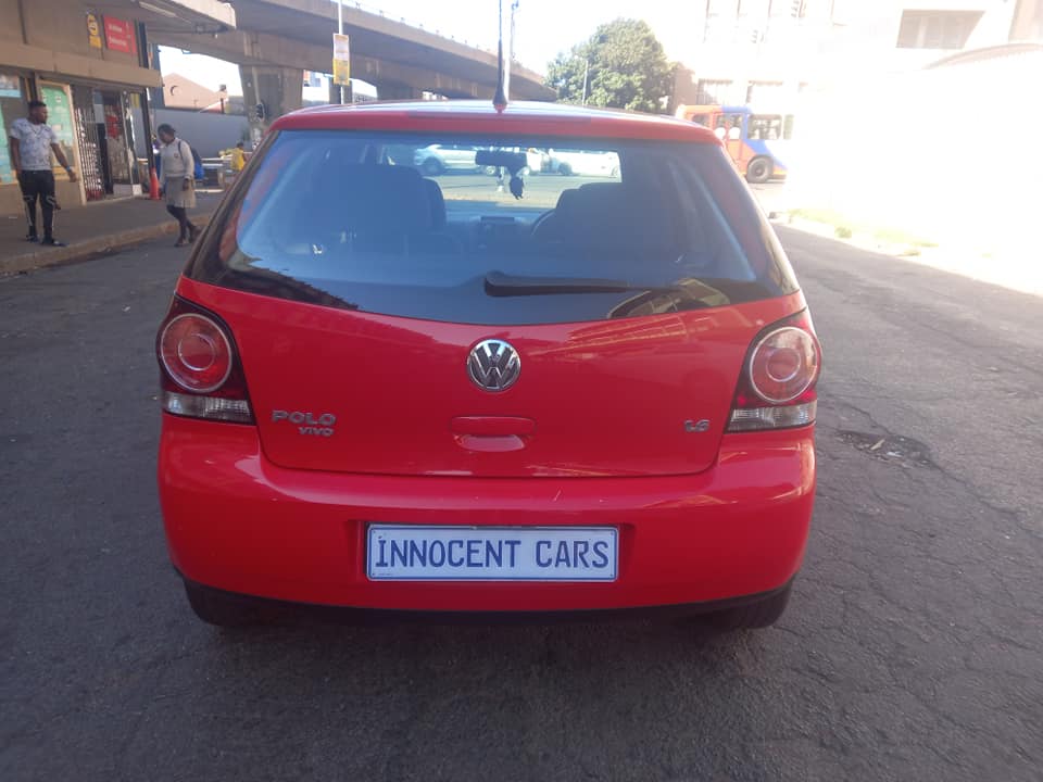 2014 VW POLO VIVO 1.6 PETROL,  MANAUL TRANSMISSION, RED COLOUR