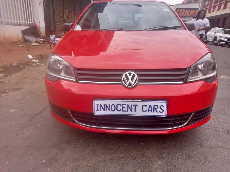 2012 VW POLO VIVO 1.4 TRENDLINE PETROL, RED COLOUR, MILEAGE . HAS SUNROOF.