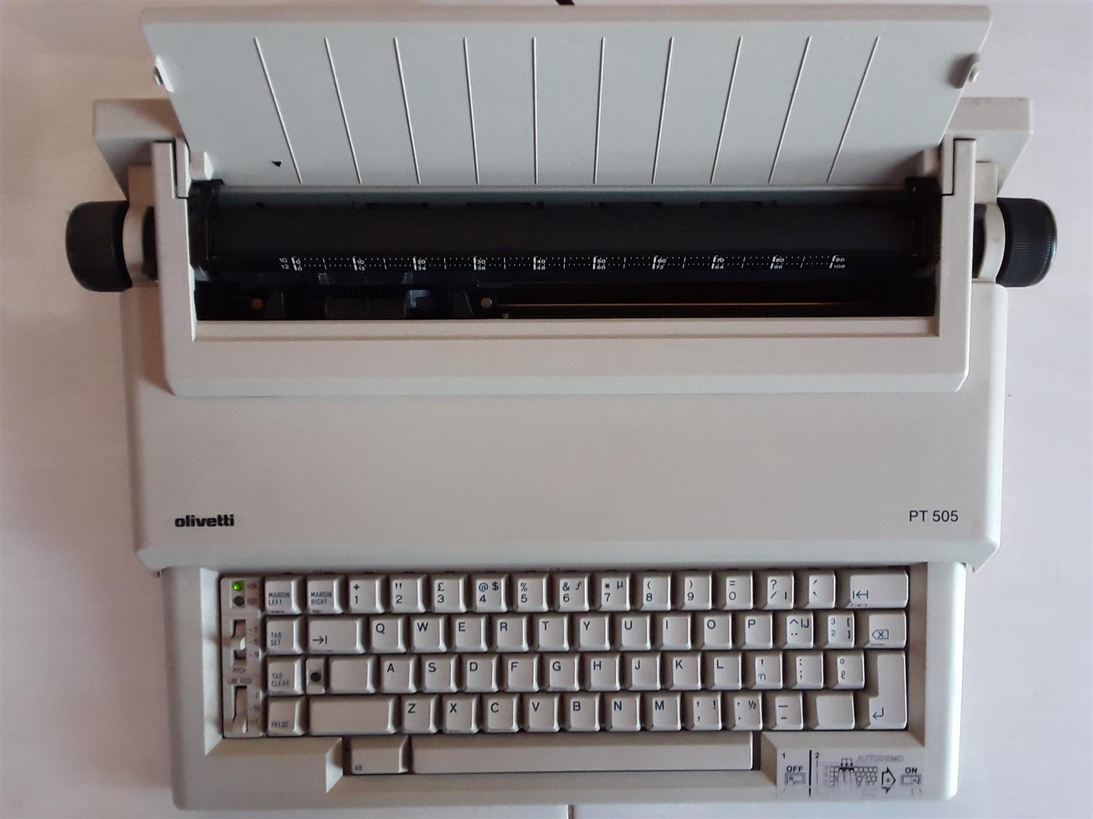 Olivetti PT505 Electric Typewriter with User Manual and new Ribbon. Working perfectly. 