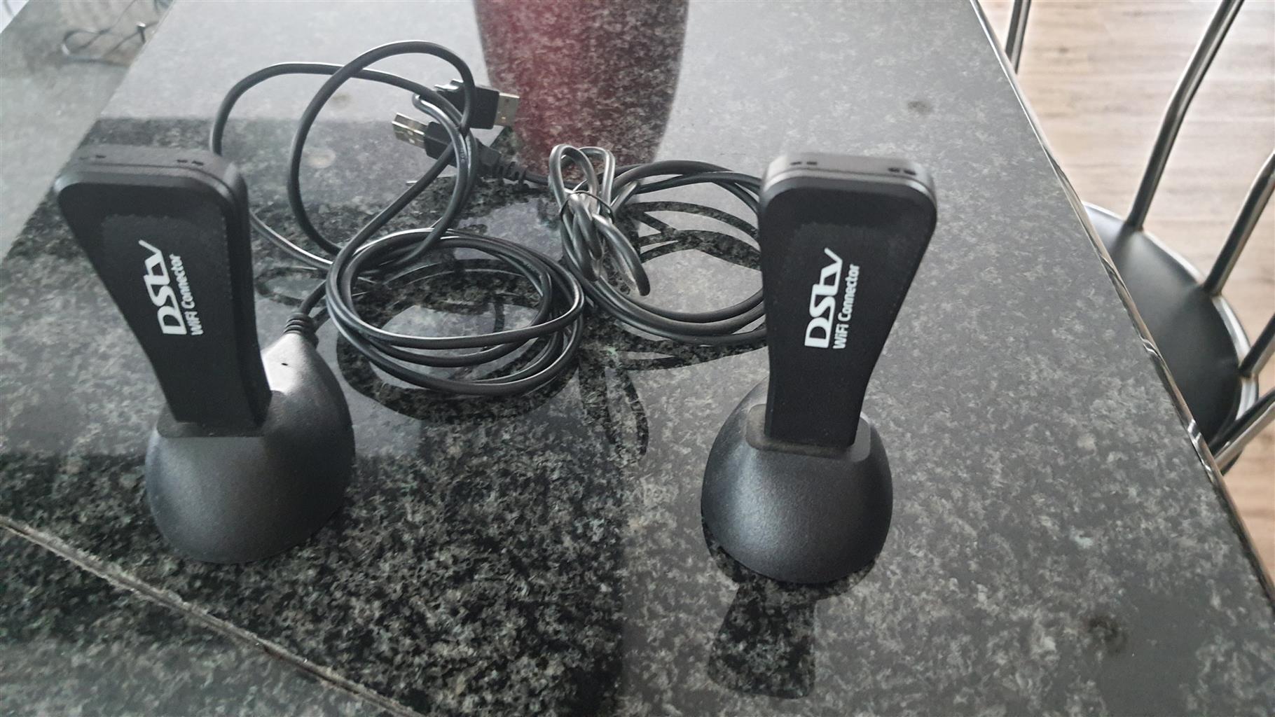 2 x DSTV explorer decoders 2 x Ellies remote blasters and 2 x DSTV WIFI connect
