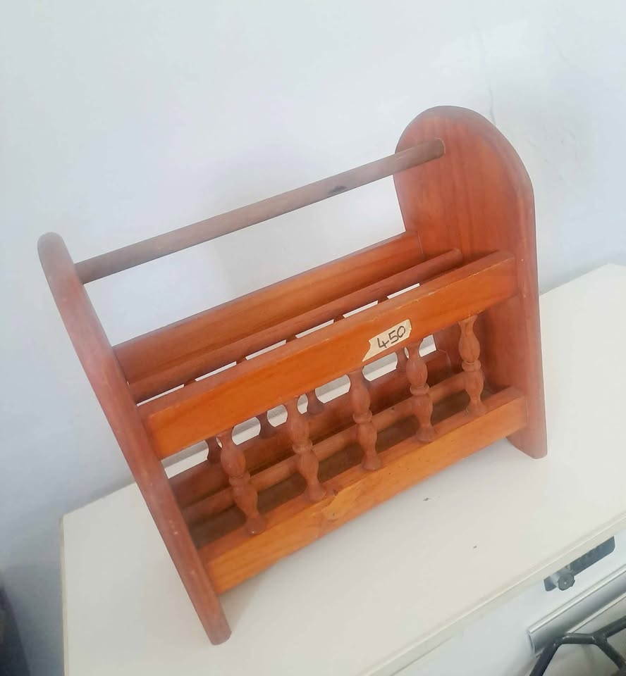 Vintage wooden magazine rack.