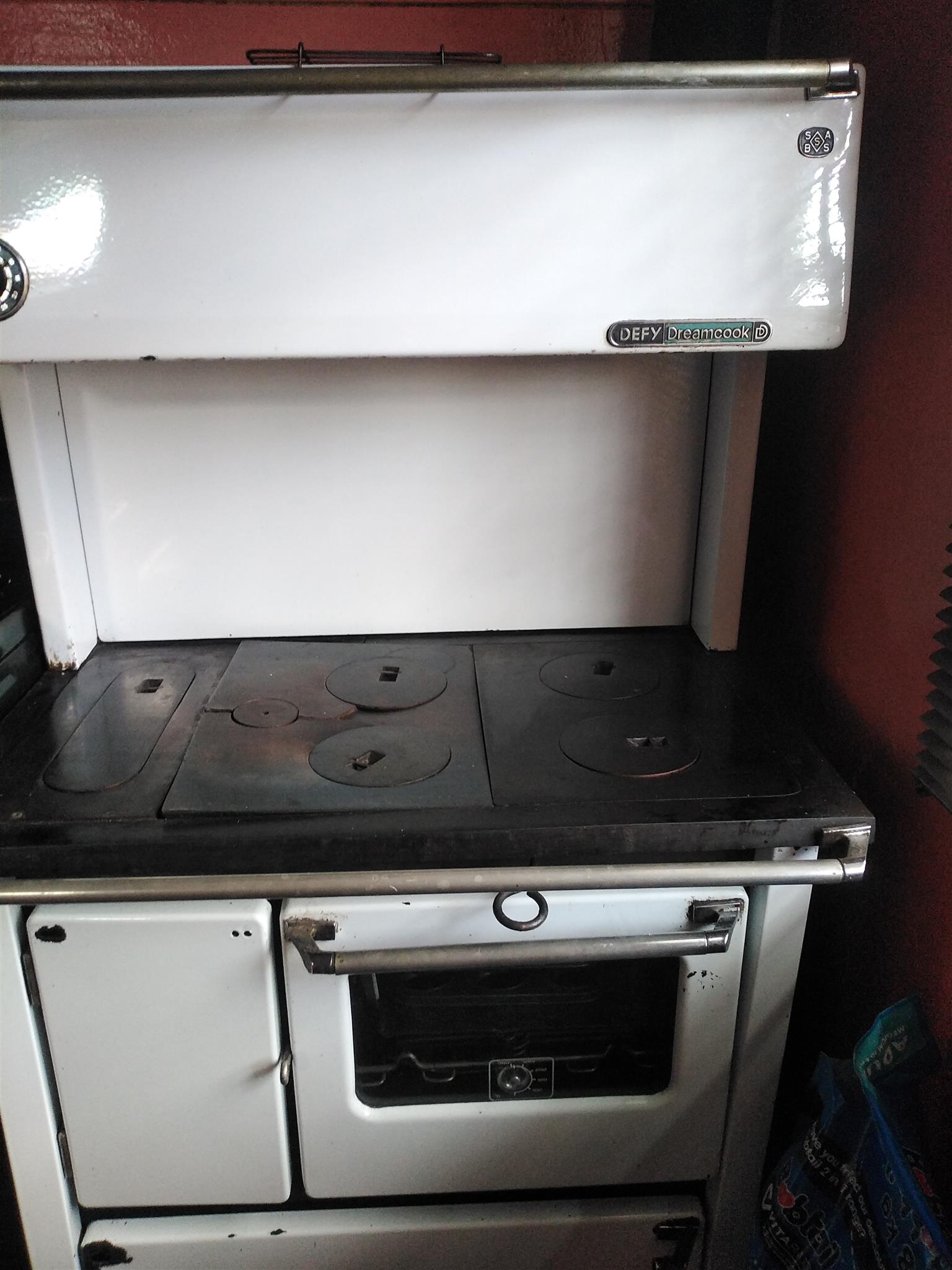 Defy Coal Stove antique.. Needs a bit of TLC missing parts are door handle,  draw | Junk Mail