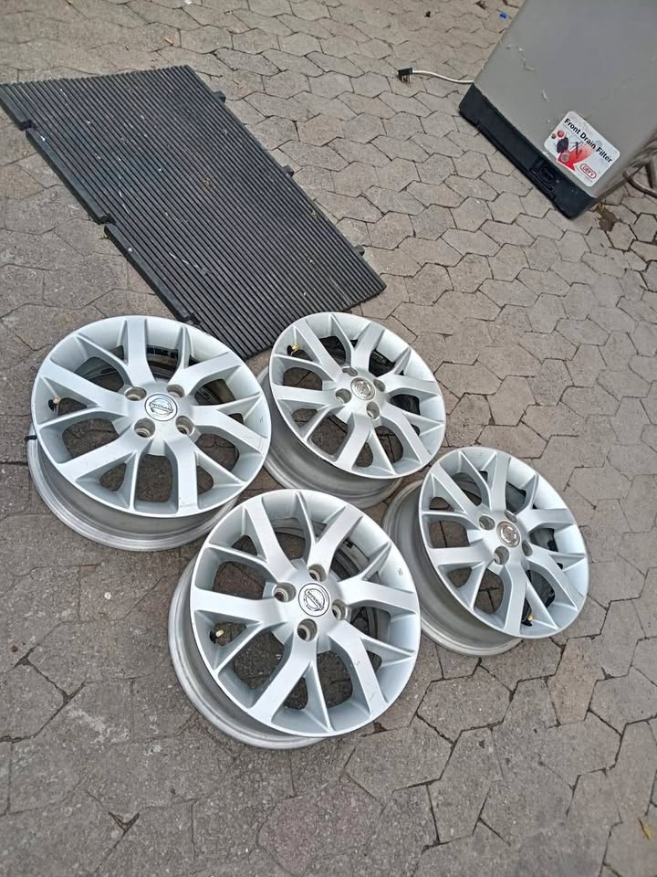 Set of 15 inch Nissan Almeria original mags for sell - Private Seller Set of 15 inch Nissan Almeria original mags for sell - Private Seller