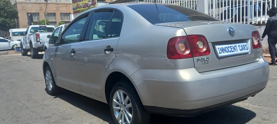2014 VW POLO VIVO 1.6 SEDAN, MANUAL TRANSMISSION, GOLD COLOUR, MILEAGE
