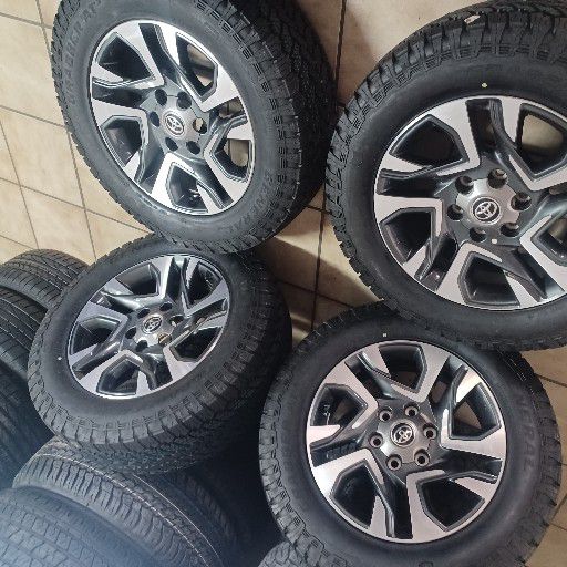 Toyota fortuna rims and general grabber at3