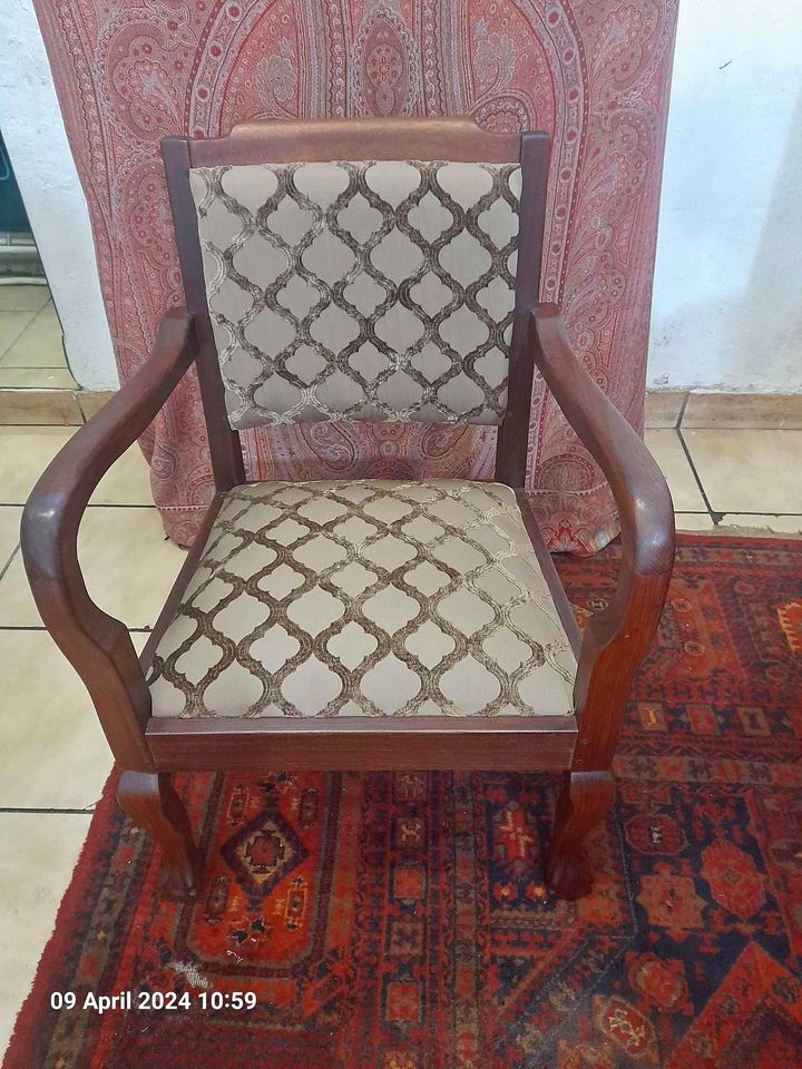 An imbuia Ball & Claw Armchair