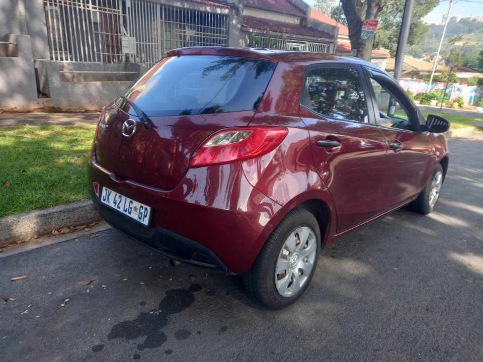 2011 MAZDA 2 1.5 Petrol, Manual, 85k Call Innocent . Maroon Color, Mileage