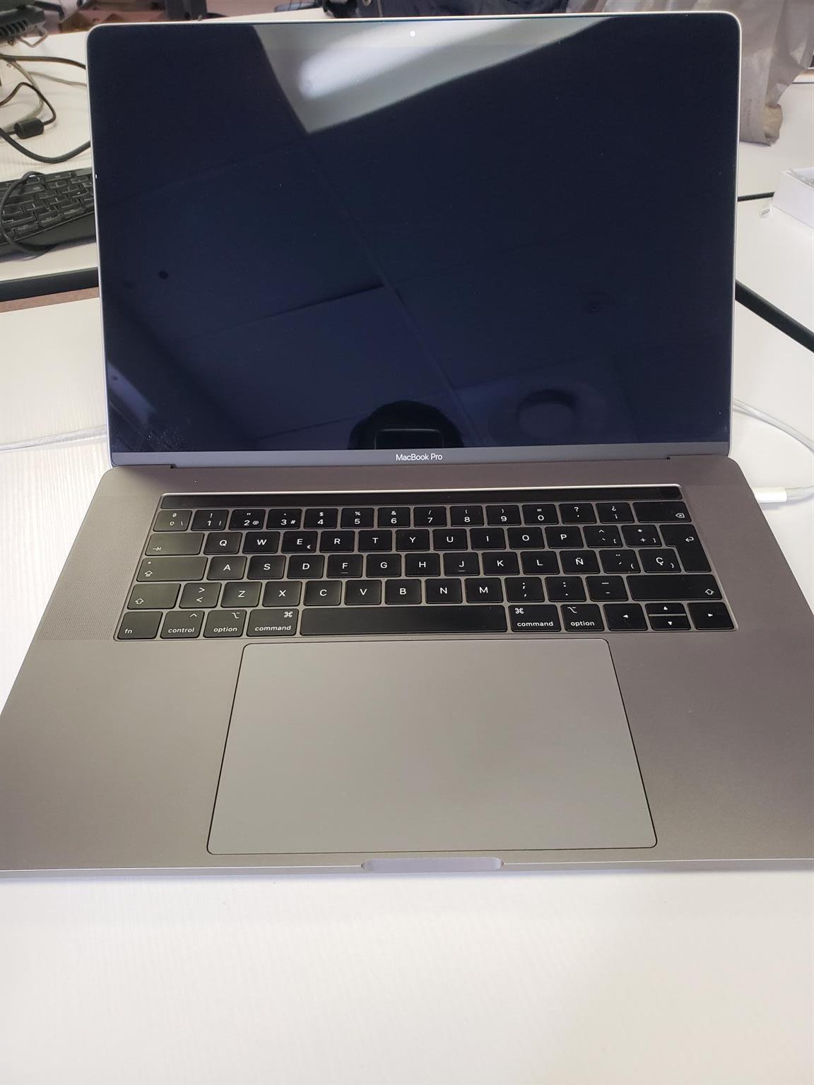 MacBook Pro (15-inch, 2019) with Touchbar | Junk Mail