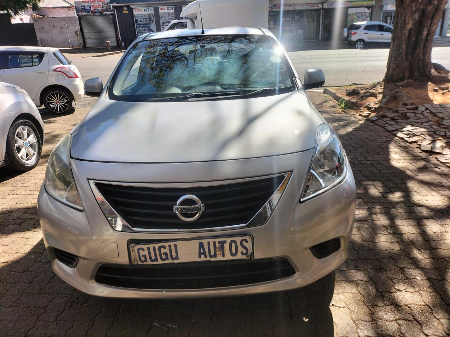 2015 Silver Nissan Almera sedan 1.5 Manual milage 86,000 km petrol