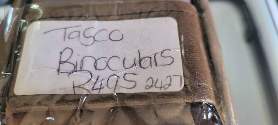 Tasco Binoculars with bag
