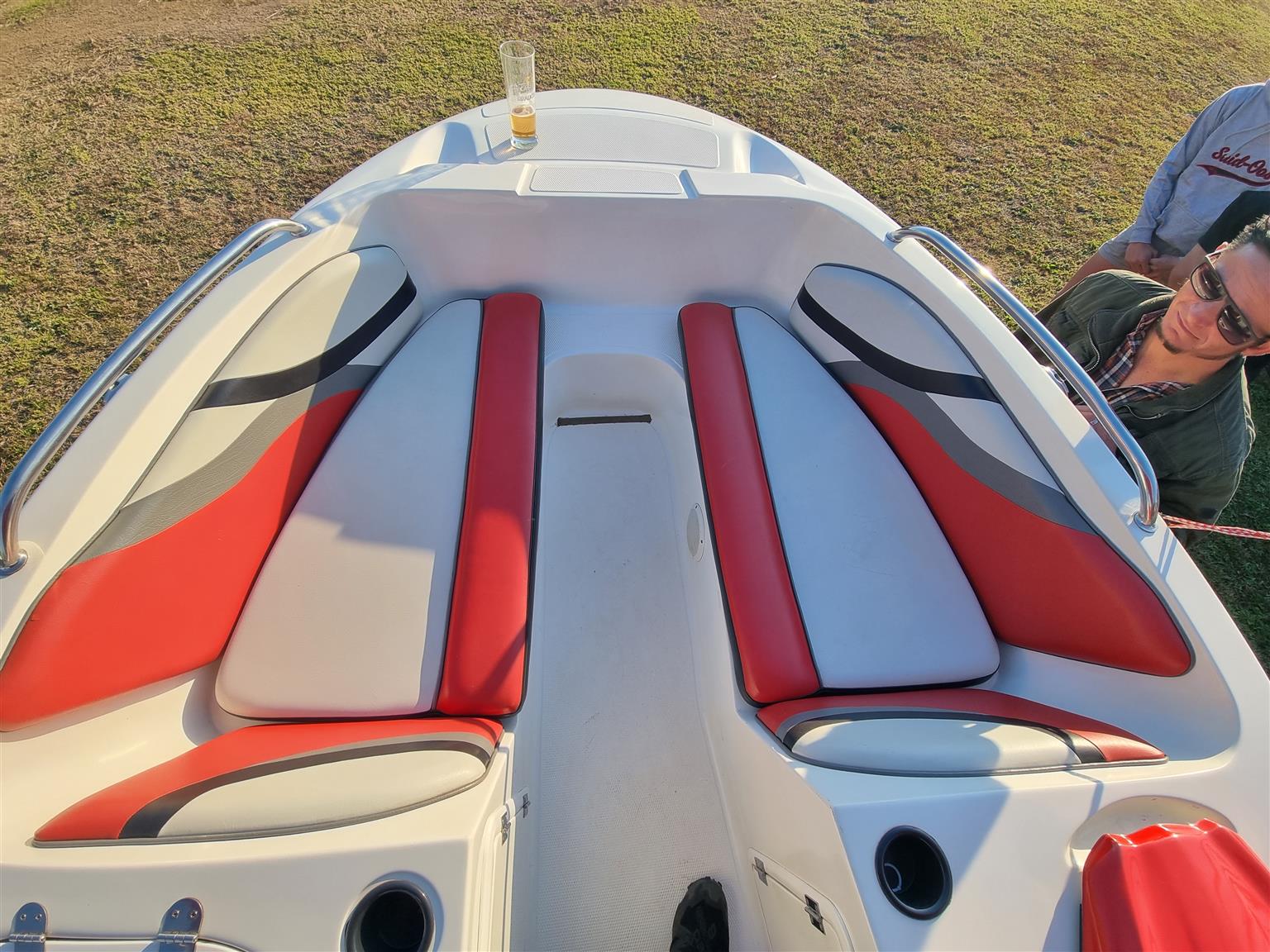 18 ft Exspression Funster boat with 150 Optimax Murcury Motor