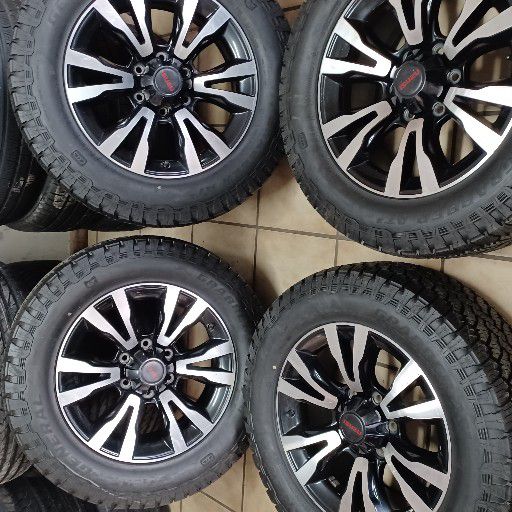 Isuzu rims and general grabber at3 tyres
