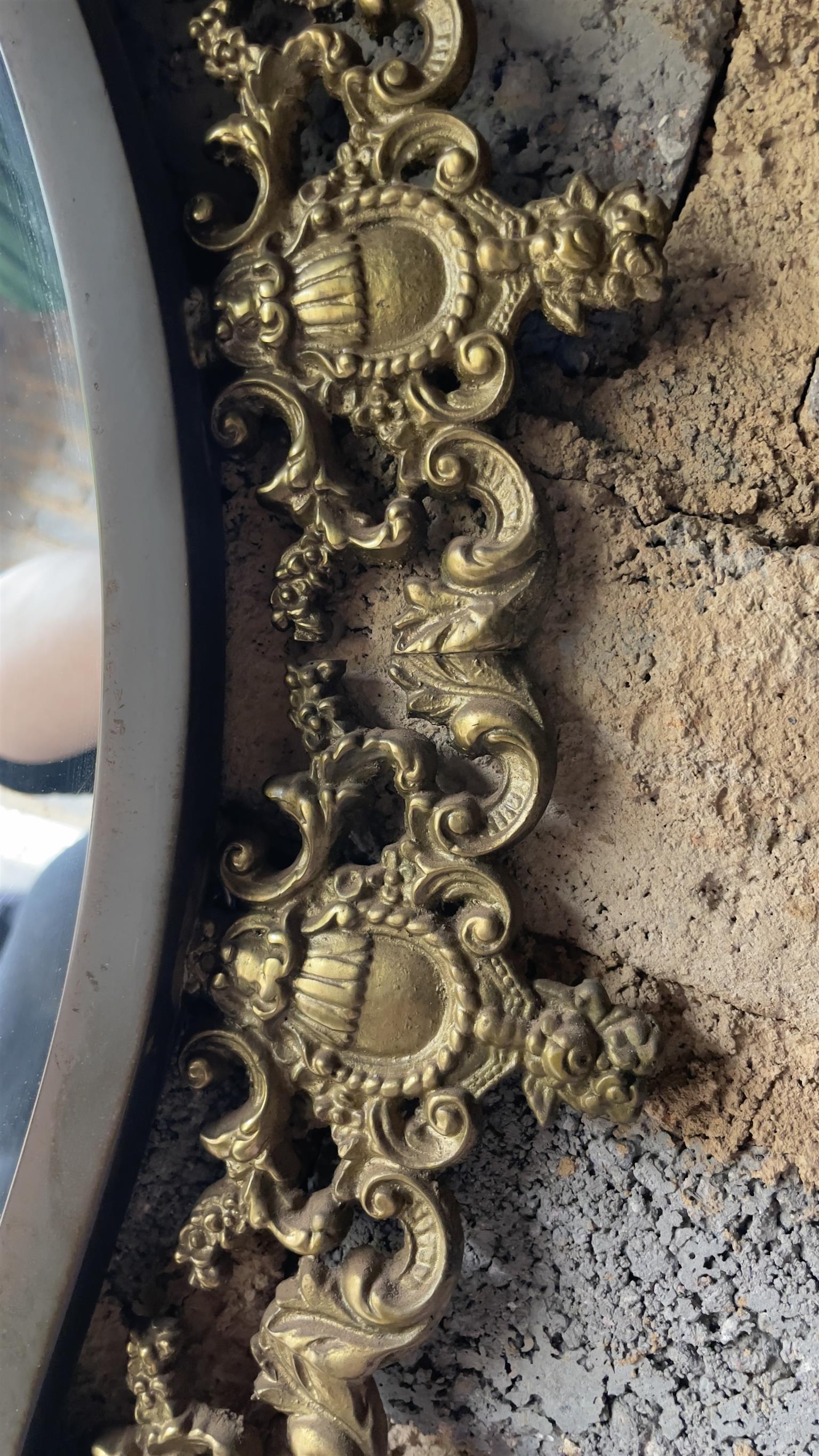 Stunning ornate moulded brass wall mirror and half moon marble table