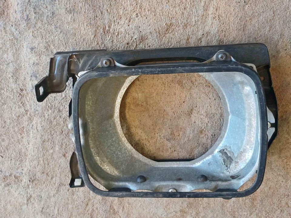 Datsun 1000 / 1200, head lamp, holder - Private Seller