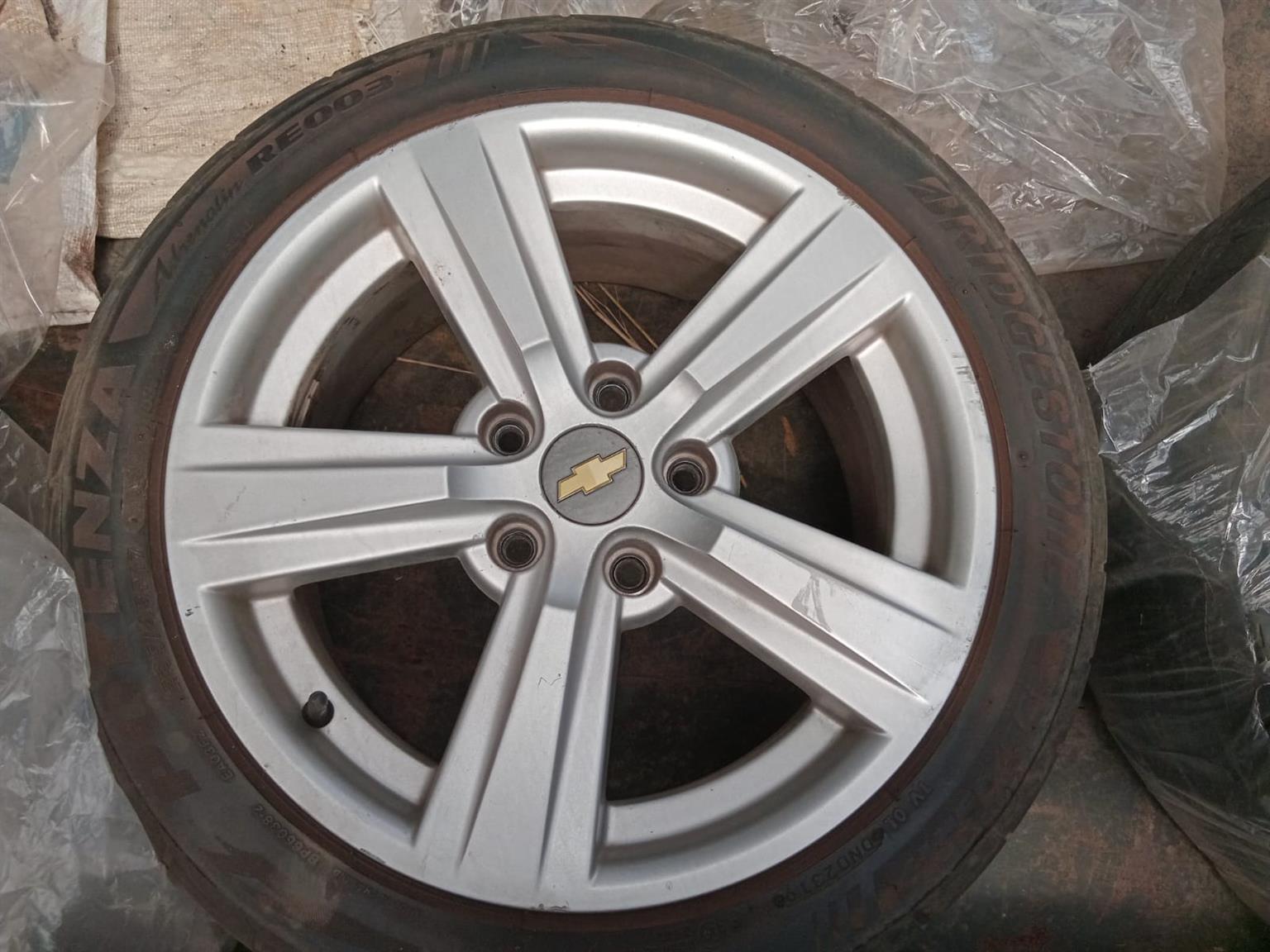 Chevy lumina ss original aluminum mags with 2 good tires. - Private Seller Chevy lumina ss original aluminum mags with 2 good tires. - Private Seller