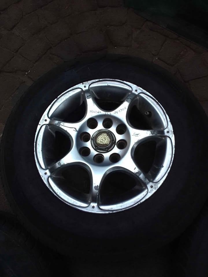 Mazda 323 rims n tyer size 13 inche for sale - Private Seller Mazda 323 rims n tyer size 13 inche for sale - Private Seller