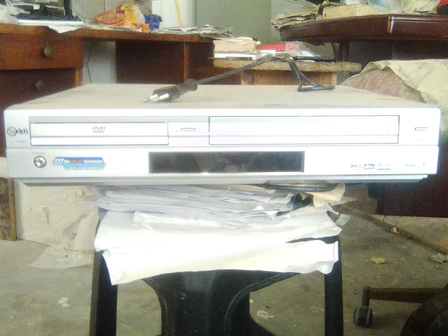 LG DVD AND VCR PLAYER AND RECORDER PLUS MP3/ RADIO