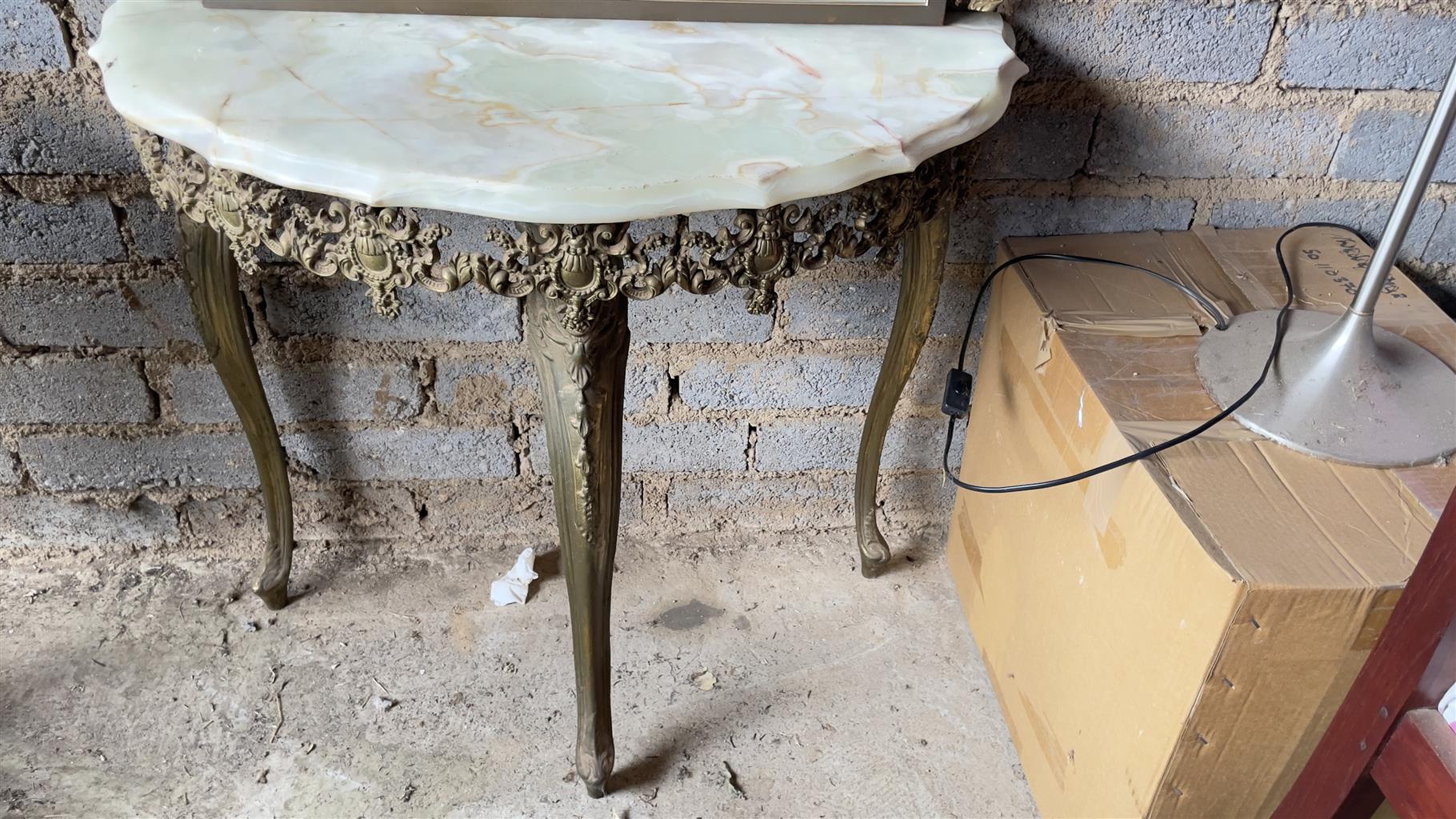 Stunning ornate moulded brass wall mirror and half moon marble table