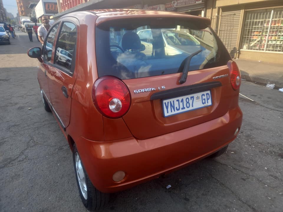 2009 CHEVROLET SPARK 1.1 PETROL, MANUAL TRANSMISSION, ORANGE COLOUR, MILEAGE