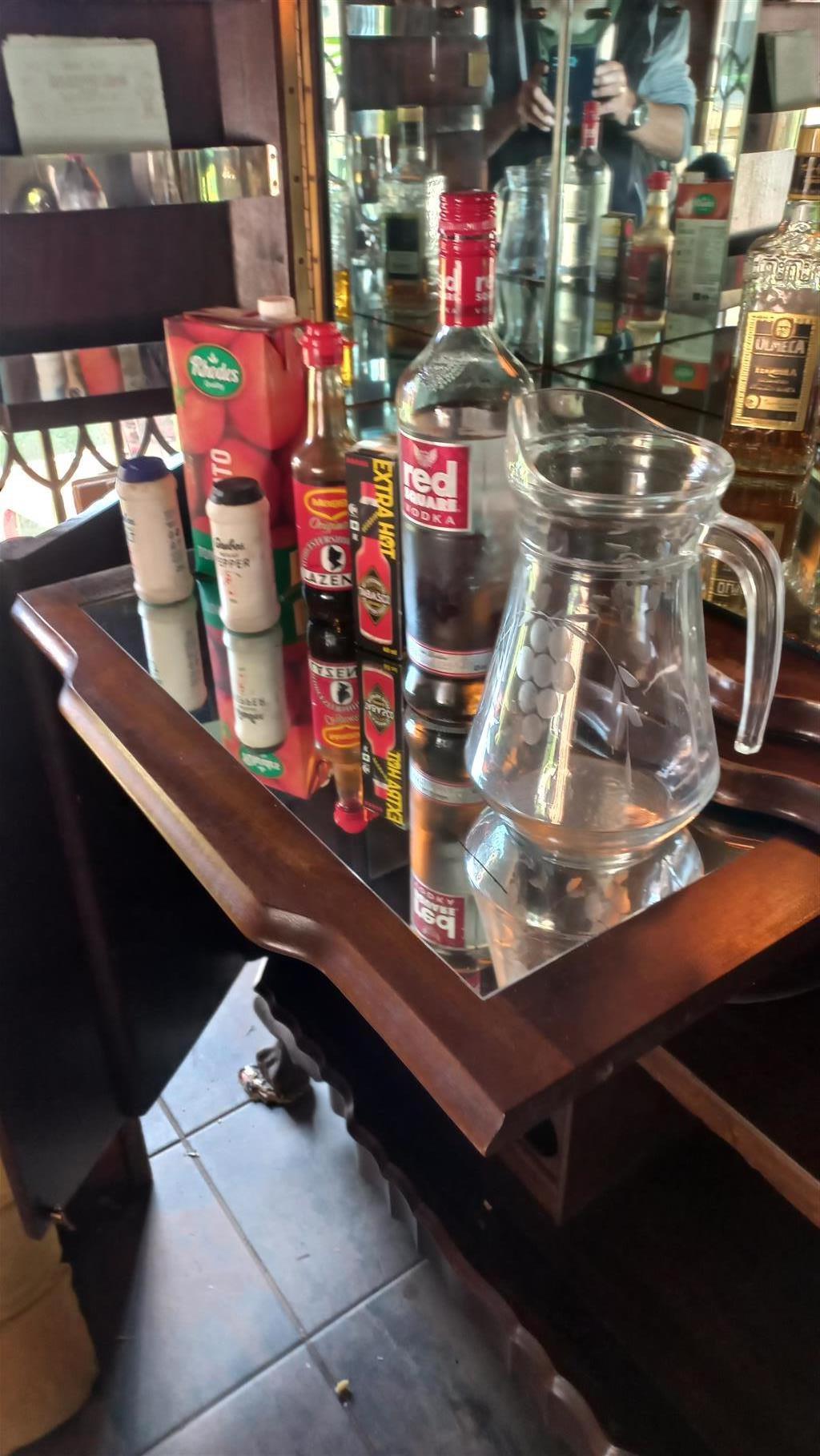Imbuia ball and claw liquor cabinet