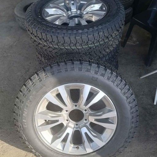 Isuzu silver rims and tyres