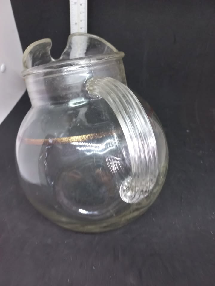 Vintage tilt ball pitcher with ice spout