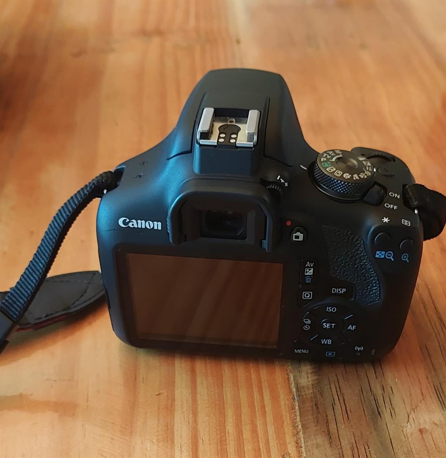 Canon EOS 2000D Camera, Canon 18-55mm lens, bag, battery, memory card