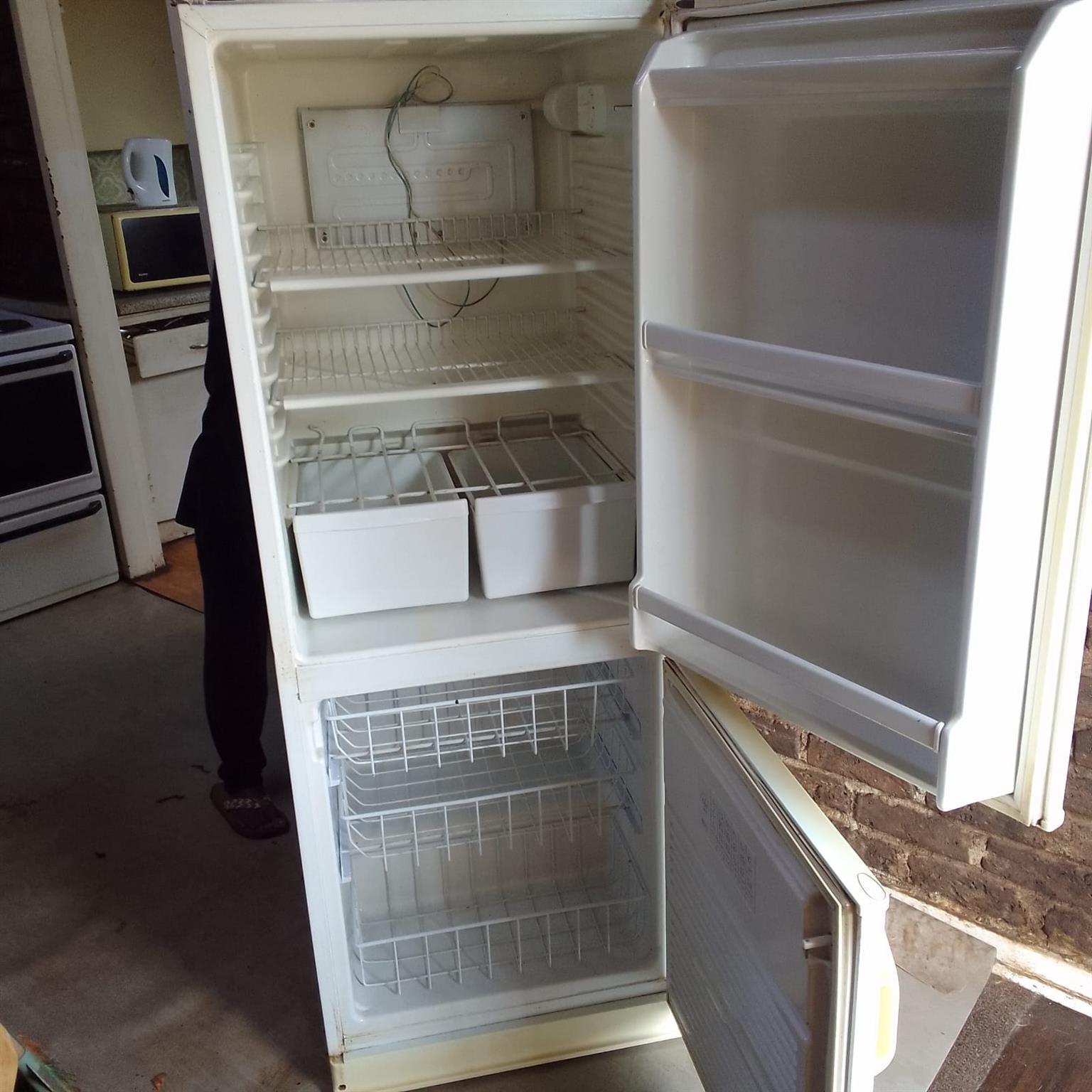 Defy 10kg front loader washing machine plus defy double door fridge