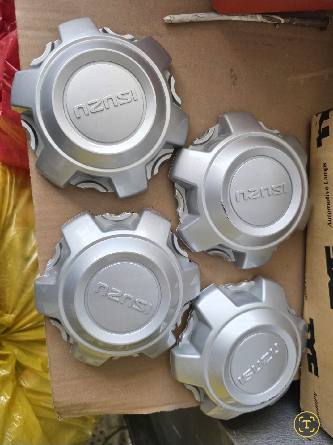 Isuzu centre caps - FOR MAGS AND RIMS. - Private Seller Isuzu centre caps - FOR MAGS AND RIMS. - Private Seller