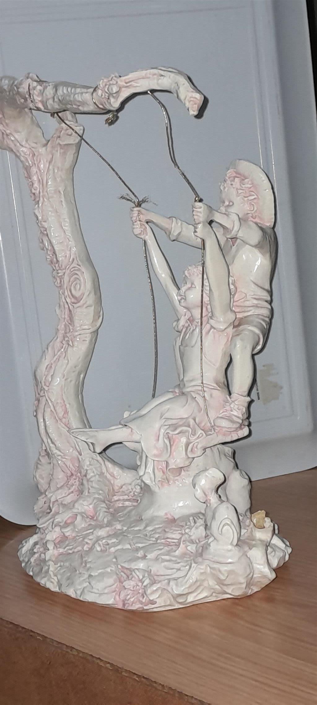 Giuseppe Armani The swing statue
