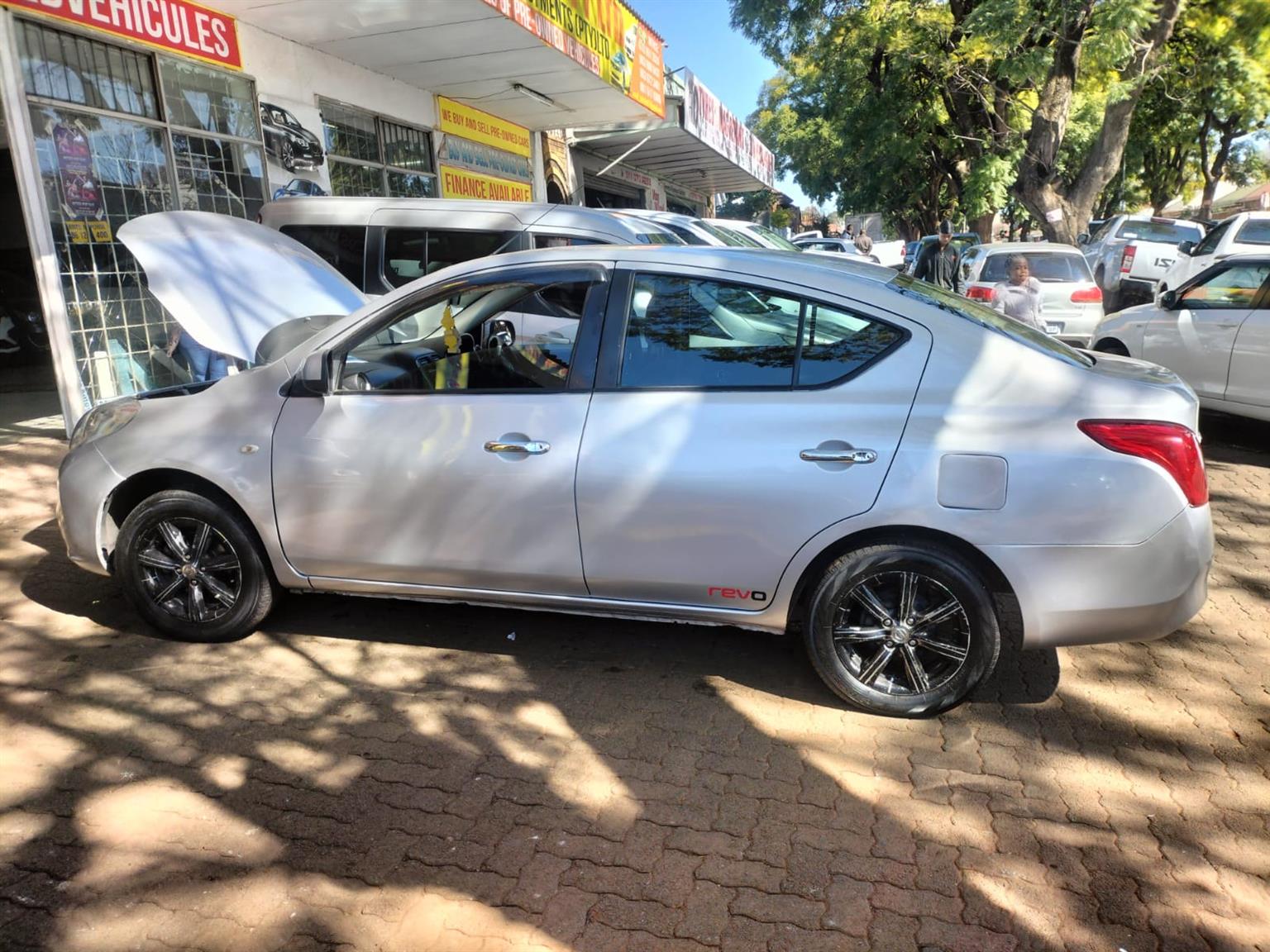 2015 Silver Nissan Almera sedan 1.5 Manual milage 86,000 km petrol