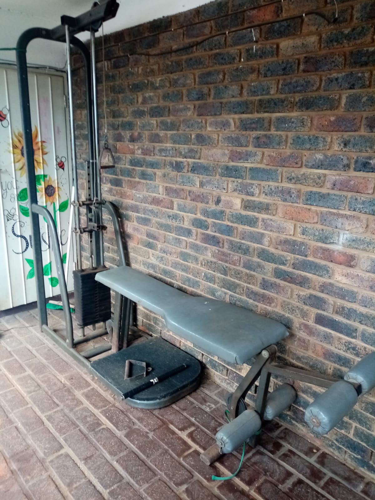 Heavy duty upright standing gym and bench