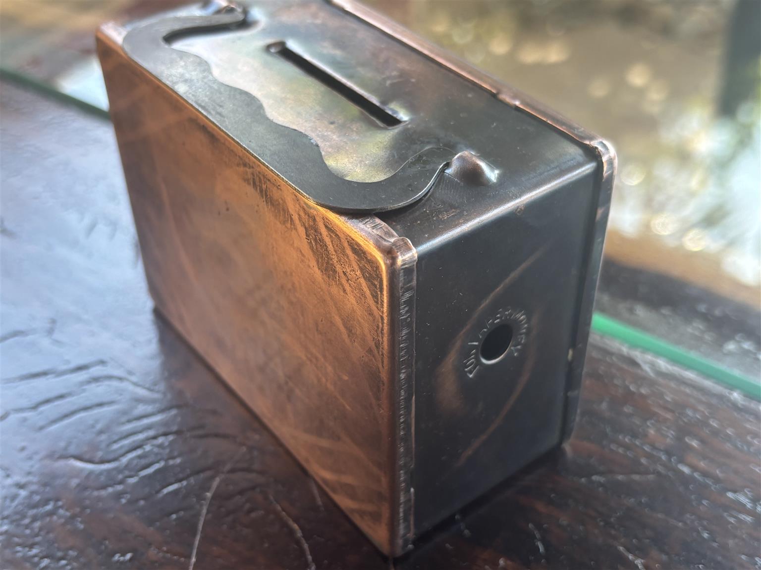 Antique piggy bank made with steel and copper Unique product